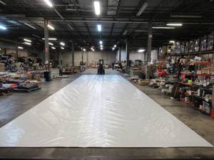 lot 211 image: NEW Vinyl Tarp - 16.33 x 60  Black  White Vinyl tarp - 9 oz. Lightweight Duty