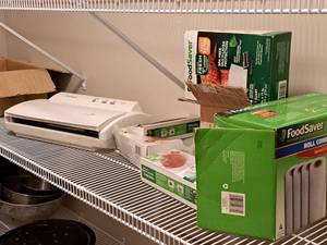lot 363 image: Food Saver Food Sealer Machine with Food Saving Supplies, Pre-Cut Saver Bags