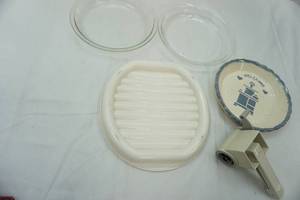 lot 37 image: pie plates, pampered chef cheese grater, and Rubbermaid microwave safe rack