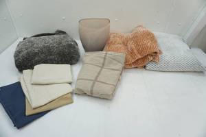 lot 63 image: throw blankets, pillow cases, sparkly waste basket