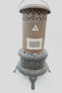 lot 115 image: Antique Perfection Oil Heater 2 tall
