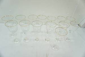 lot 132 image: Wine Glasses with gold rims