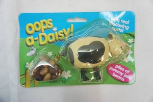 lot 167 image: oops-a-Daisy Jelly Bean Dispenser. 2002