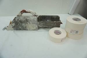 lot 216 image: drywall taping tool & tape & joint tape