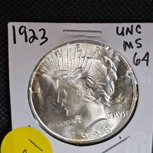 lot 31 image: 1923 Peace Dollar UNC MS64