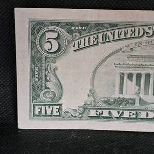 lot 34 image: 1953 $5 Red Seal US Note