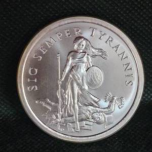 lot 55 image: 2 oz Silver Sheild Round