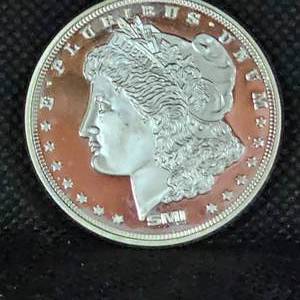 lot 57 image: 1 oz Morgan Round