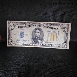 lot 98 image: 1934 A $5 N. Africa Silver Certificate
