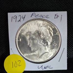 lot 102 image: 1924 Peace Dollar UNC