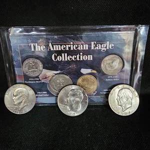 lot 114 image: American Eagle Collection(4) and 3 Ike Dollars