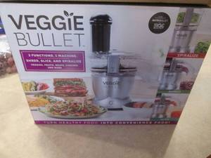 lot 121 image: New Veggie Bullet...