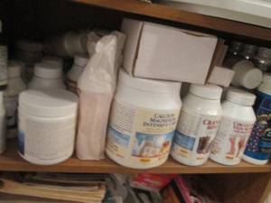 lot 125 image: Shelf crammed full of health supple...