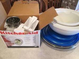 lot 133 image: Kitchen Aid attachments and serving...
