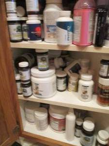 lot 136 image: Cupboard filled with nutritional su...