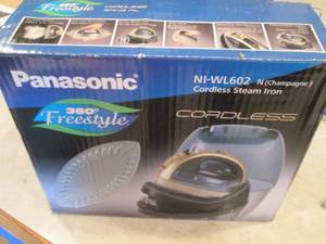 lot 154 image: Panasonic cordless steam iron...