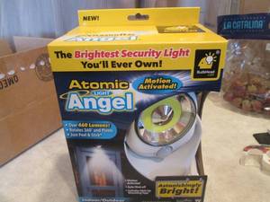 lot 168 image: Motion activated atomic angel light...