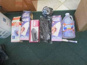 lot 311 image: Steam irons, closet space savers, m...