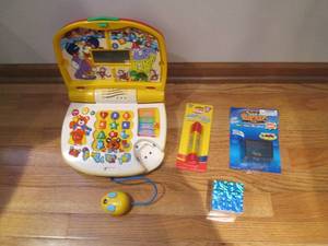 lot 32 image: V-tech little smart big top laptop,...