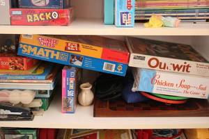 lot 204 image: 3 shelves contents of misc kids gam...
