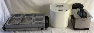 lot 66 image: Kitchen Small Appliance Bundle - Buffet Server, Oster Expressbake Breadmaker and T-fal Easy Pro Deep Fryer