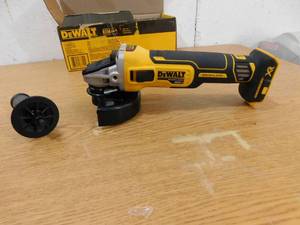 lot 169 image: NEW - DEWALT 20V MAX XR Cordless Brushless 4.5 in. Slide Switch Small Angle Grinder with Kickback Brake (Tool Only)