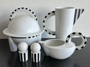 lot 127 image: Cupola Strada Pitcher, Gravy Boat, Salt & Pepper Shakers and Lidded Dish Designed by Mario Bellini for Rosenthal