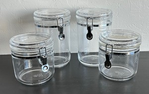 lot 129 image: Four Resin Kitchen  Storage Canisters by Felli