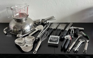 lot 209 image: Kitchen Goodies including Measuring Cups, Strainer, Graters, Cheese Slicers and More