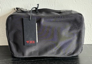 lot 217 image: New Tumi Travel Case