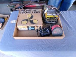 lot 28 image: Balkamp Battery Charger, Boat Motor Prop & Misc