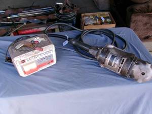 lot 13 image: Black & Decker 7 Angle Grinder & Sears Battery Charger (Works)