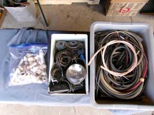 lot 29 image: Tote of Misc Plastic & Rubber Tubing, Timing & Spot Lights