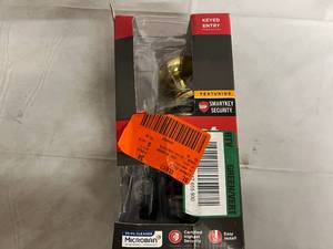 lot 91 image: Kwikset Keyed Entry Doorknob Set