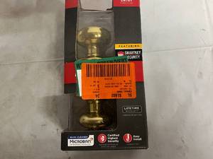 lot 93 image: Kwikset Keyed Entry Doorknob Set