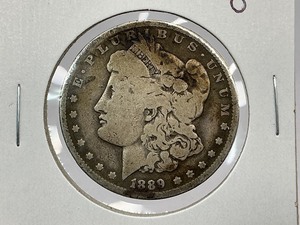 lot 31 image: 1889-O Morgan Dollar