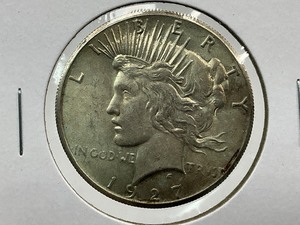 lot 49 image: 1927 Peace Dollar