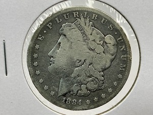 lot 82 image: 1884-S Morgan Dollar
