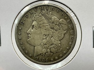 lot 99 image: 1884 Morgan Dollar