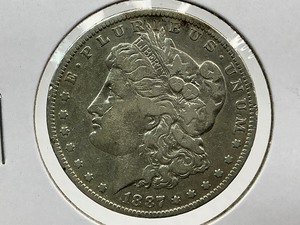 lot 102 image: 1887-O Morgan Dollar
