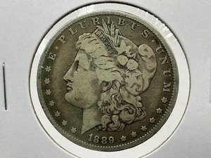 lot 104 image: 1889-O Morgan Dollar