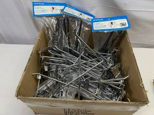 lot 17 image: Box Full of Slat Wall Hooks Variety of Sizes