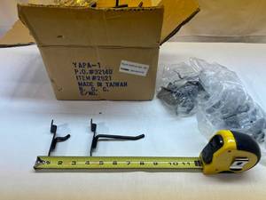 lot 19 image: Box Full of Slat Wall Hooks Variety of Sizes