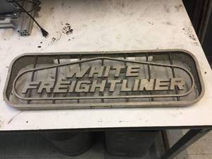 lot 190 image: White Freightliner - Aluminum Emblem - 27 12 x 8 12