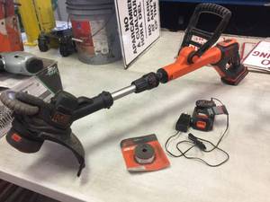 lot 334 image: Black & Decker 20V Cordless Weed Whip - 2 Batteries - Works