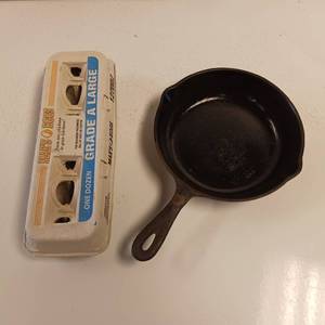 lot 7 image: No. 5 8 18 inch wide Cast Iron Skillet