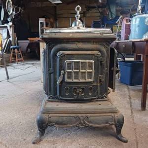 Vintage Ornate Cast Iron Wood/Parlor Stove - Chrome Top is removable for flat cooking surface