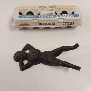 lot 69 image: Vintage Cast Iron Naughty Nelly Boot Jack