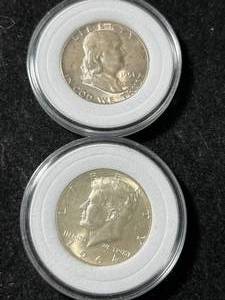 lot 36 image: 2 US SILVER HALF DOLLARS IN AIRTITES
