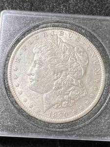 lot 53 image: 1890 US MORGAN SILVER DOLLAR IN CASE